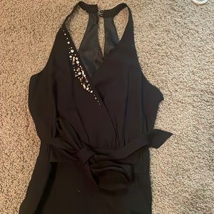 Venus wrap tie jumpsuit with jewel detail.